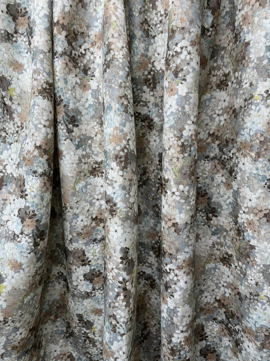Joy Blossom in Silver Mushroom, printed on premium linen. A pretty carpet of lilac blossoms.