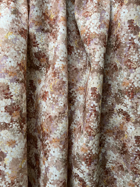 Joy Blossom in Autumn violet, printed on a premium linen. A pretty carpet of lilac blossoms.