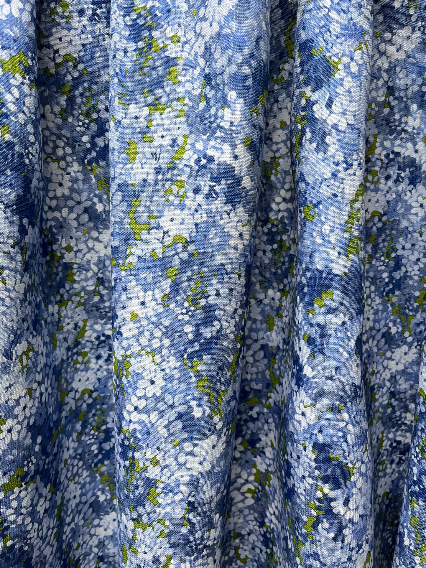 Joy Blossom in Midnight Forest, printed on premium Irish linen. A pretty carpet of lilac blossoms