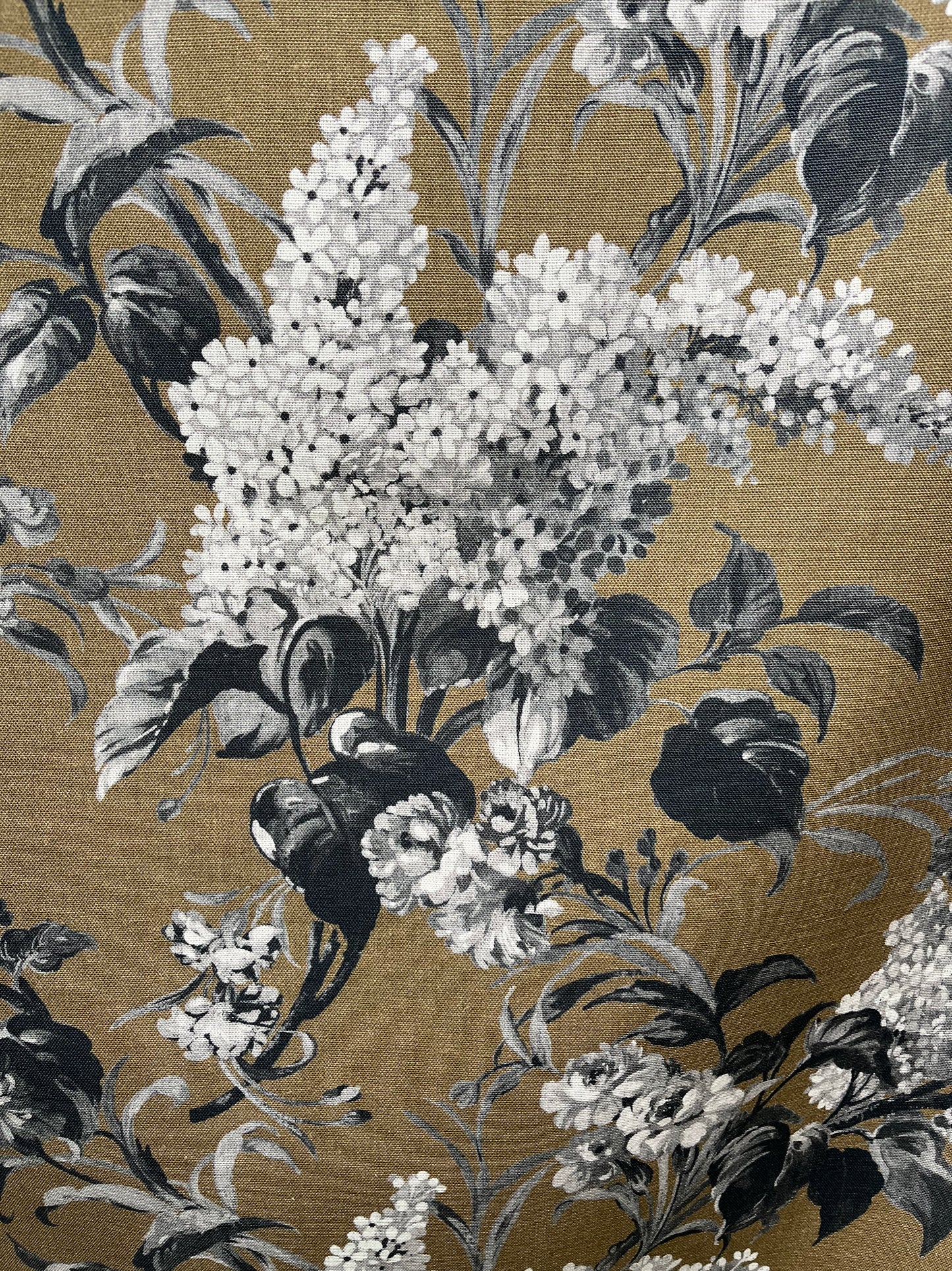 Joy Linen in Bronze, printed on premium Irish linen. A flamboyant, exuberant and joyous floral.